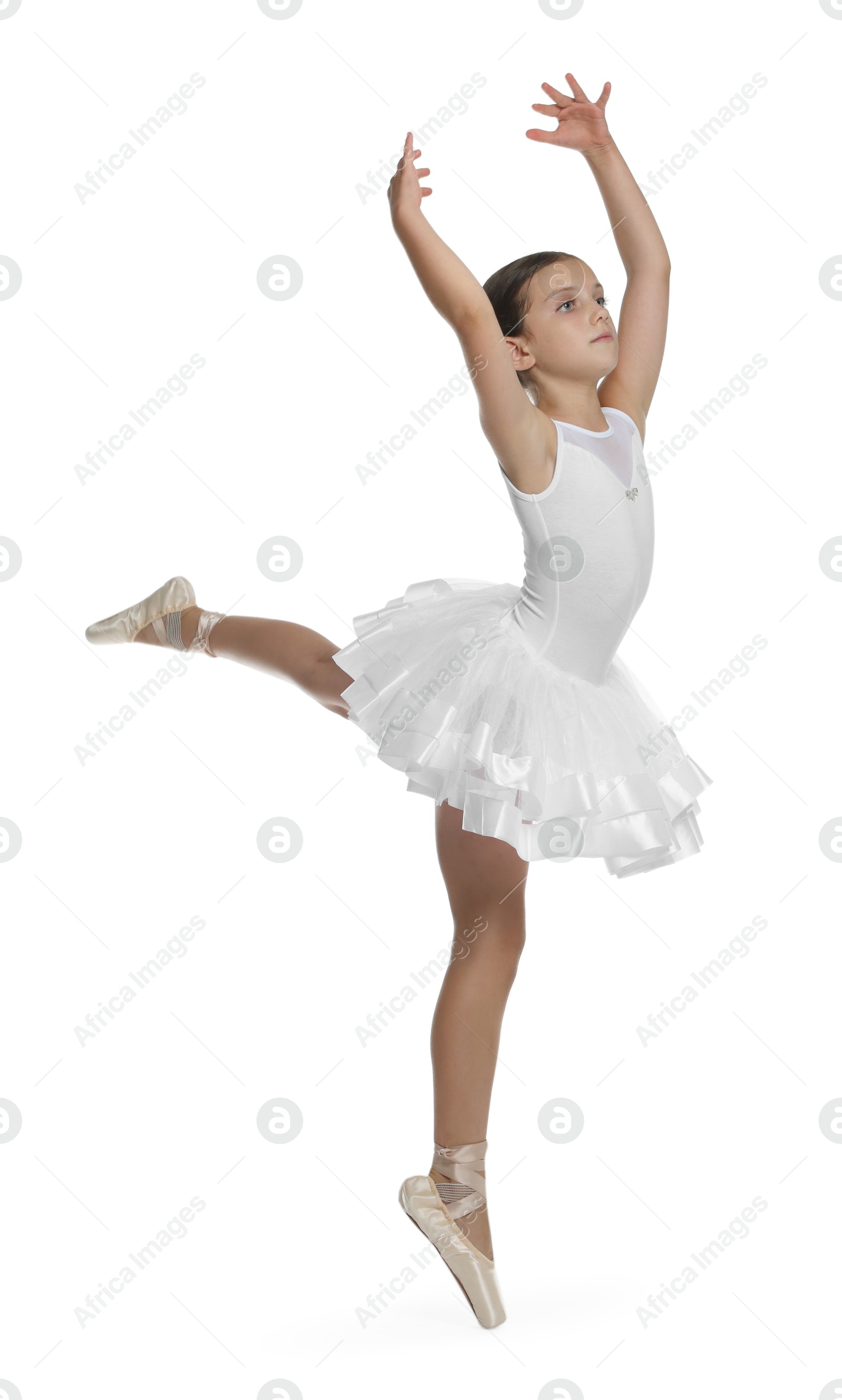 Photo of Cute little ballerina dancing on white background