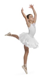 Cute little ballerina dancing on white background