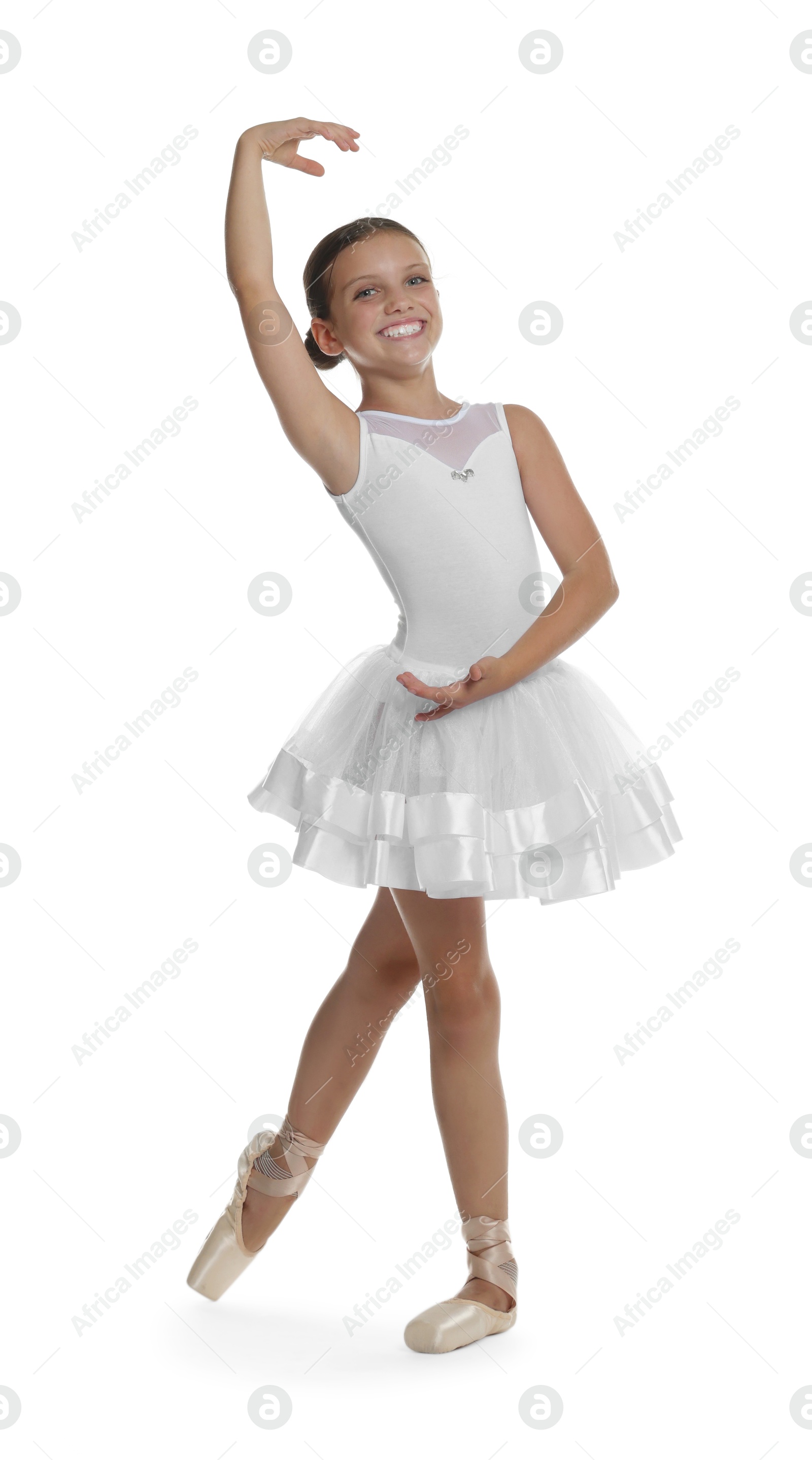 Photo of Little ballerina practicing dance moves on white background