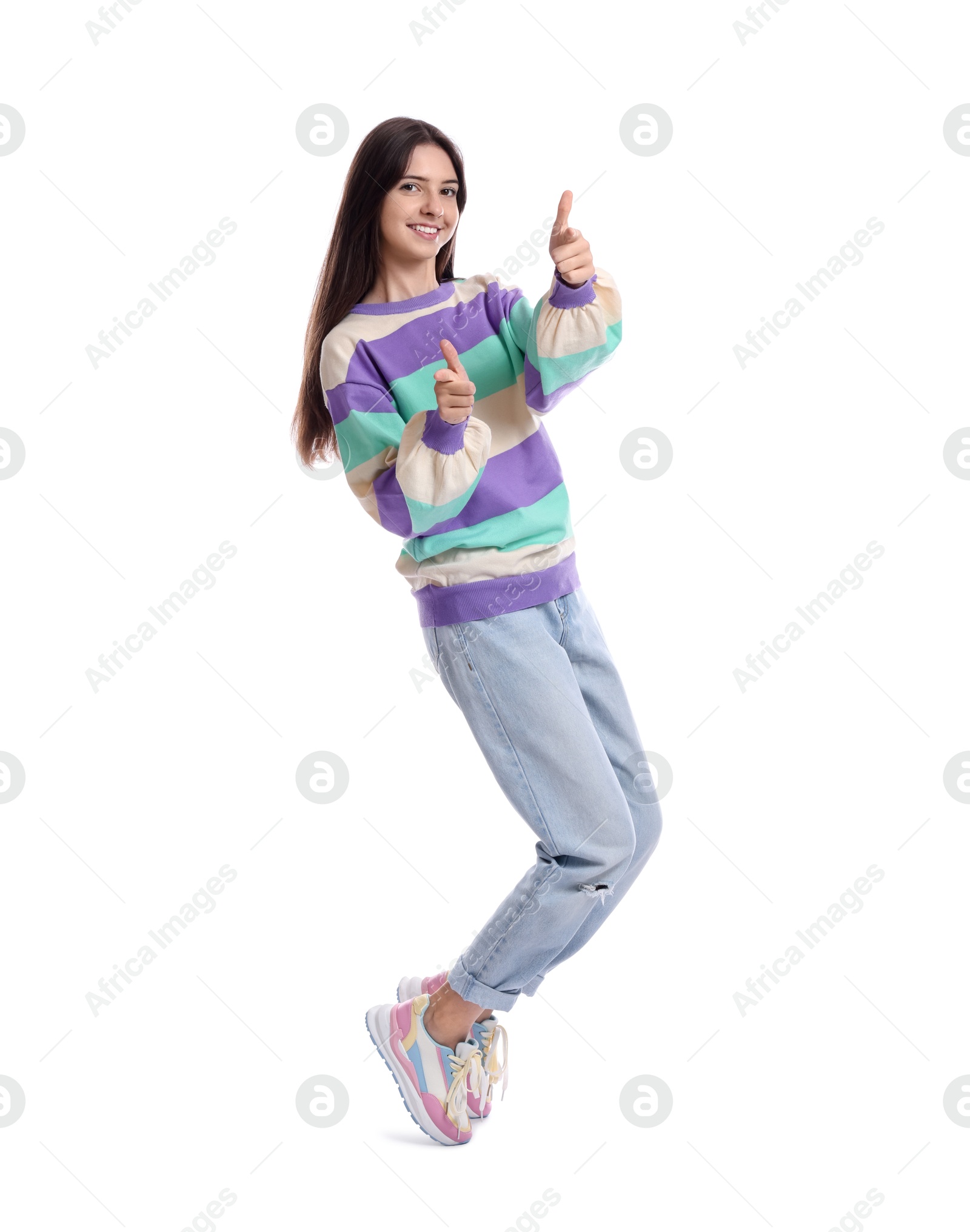 Photo of Full length portrait of teenage girl on white background