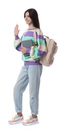 Photo of Teenage girl with backpack and book waving hello on white background