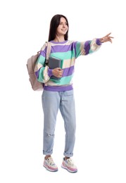 Photo of Cute teenage girl with backpack and books on white background