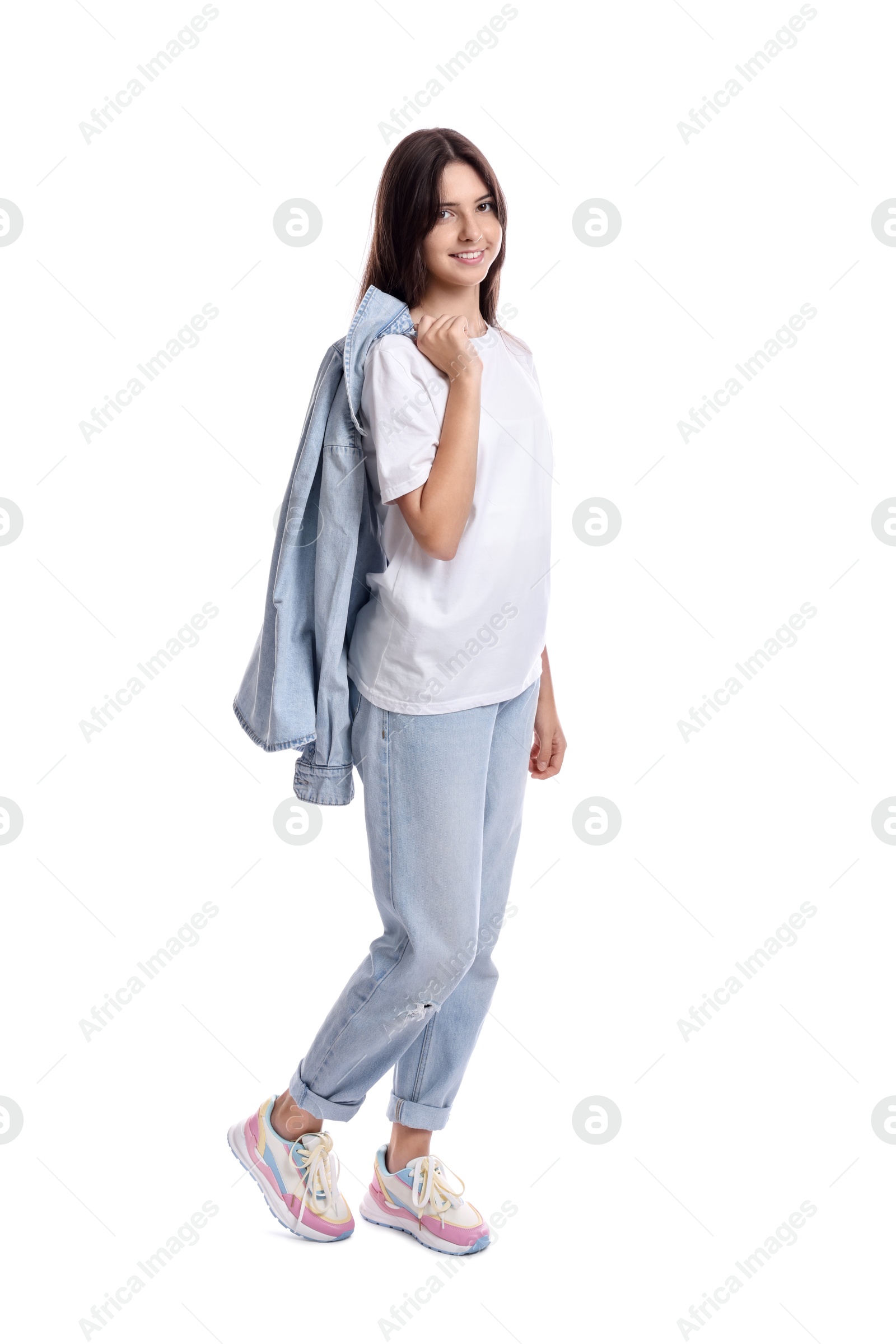 Photo of Full length portrait of teenage girl on white background