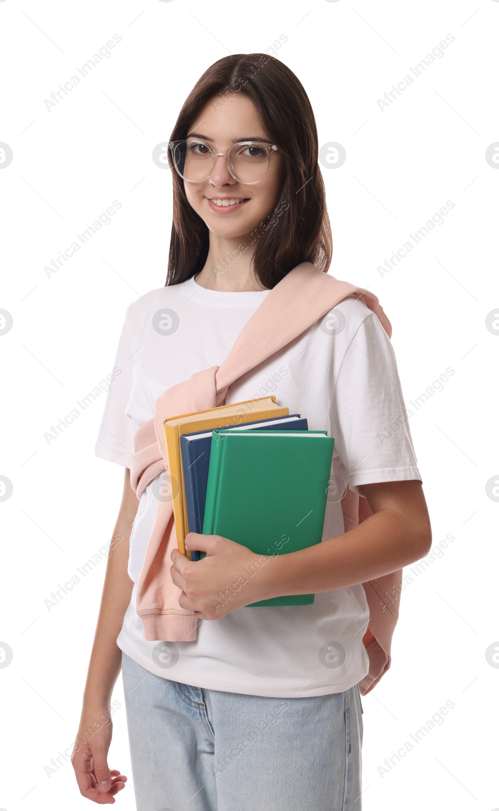 Photo of Portrait of smiling teenage girl with books on white background