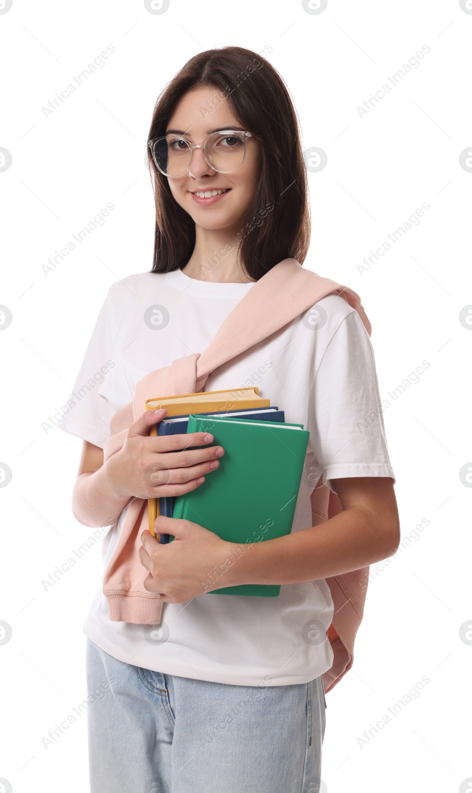 Photo of Portrait of smiling teenage girl with books on white background