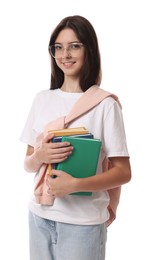 Portrait of smiling teenage girl with books on white background