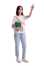 Photo of Smiling teenage girl with books waving on white background