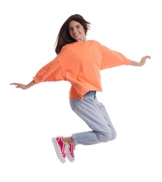 Photo of Cheerful teenage girl jumping on white background