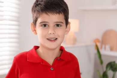 Photo of Portrait of cute little boy at home