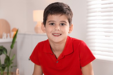 Photo of Portrait of cute little boy at home