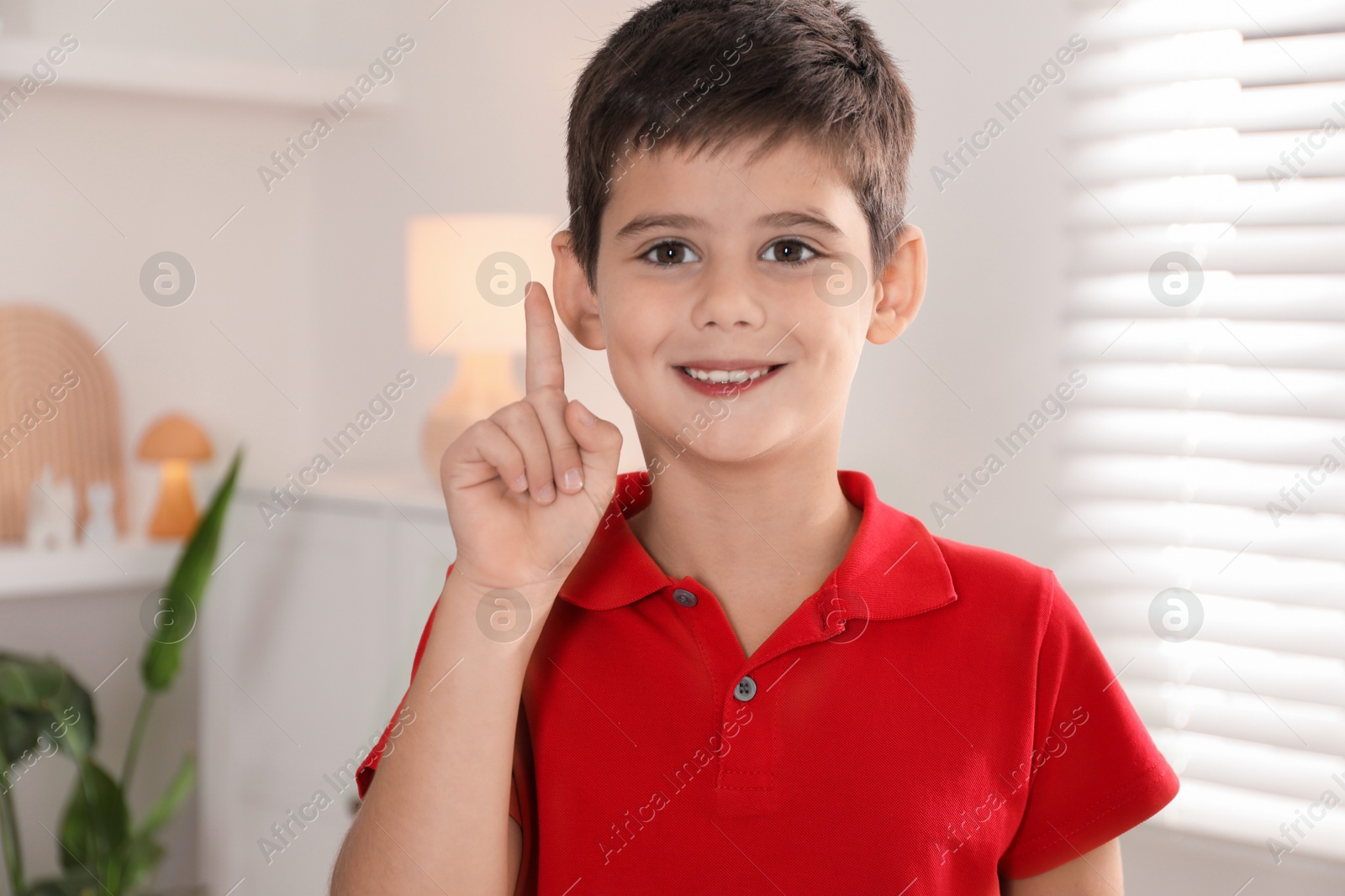 Photo of Portrait of cute little boy at home