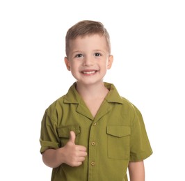 Cute little boy showing thumbs up on white background