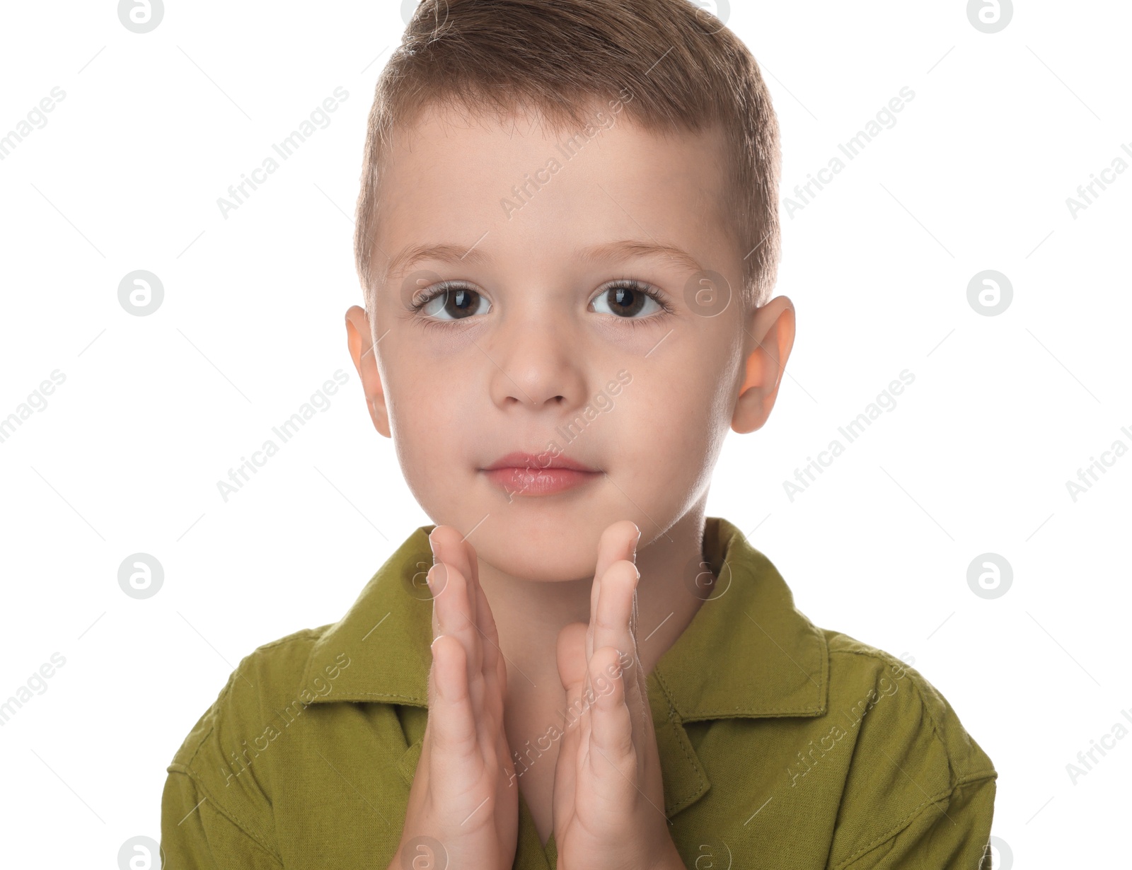 Photo of Portrait of cute little boy on white background