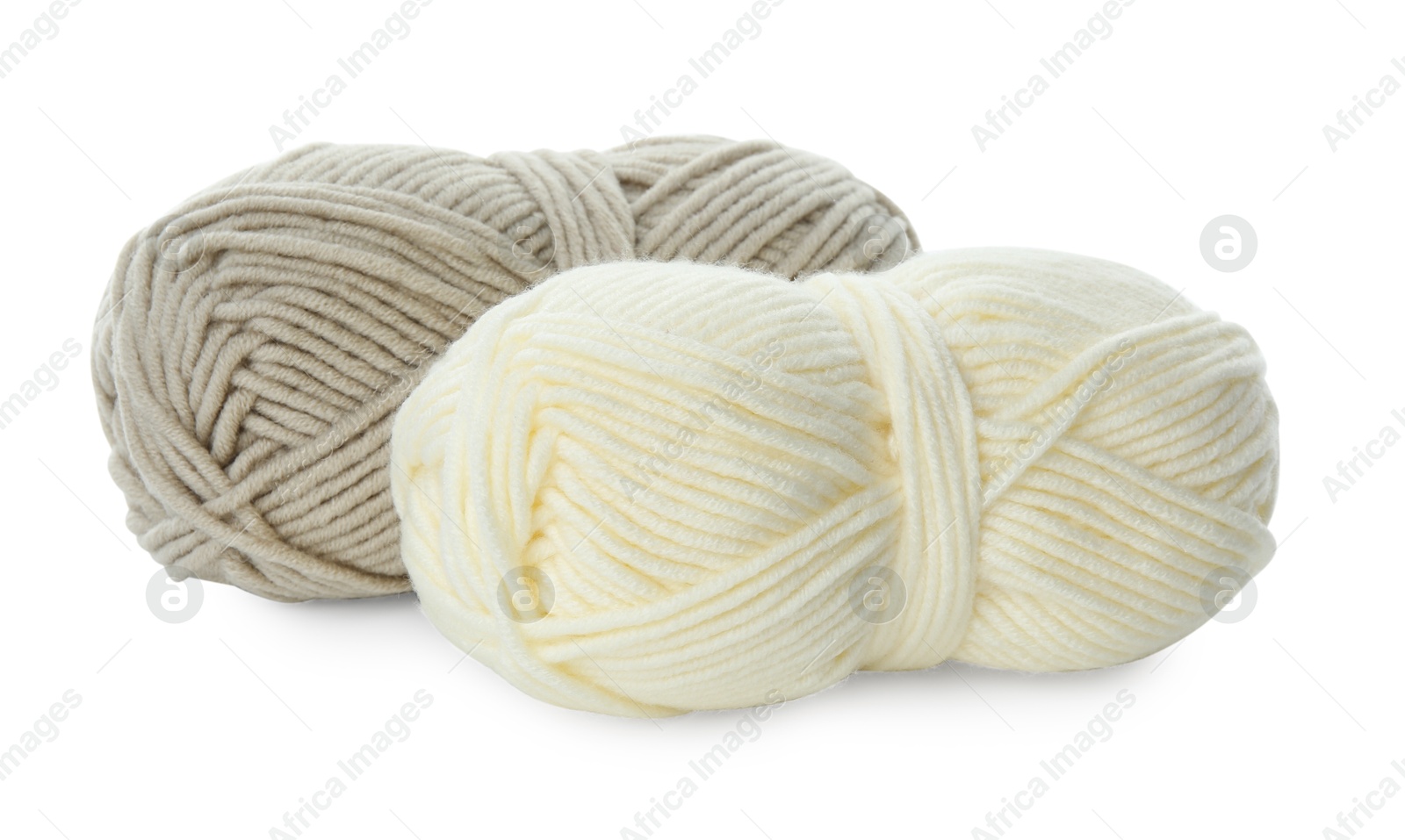 Photo of Skeins of soft yarn for knitting isolated on white