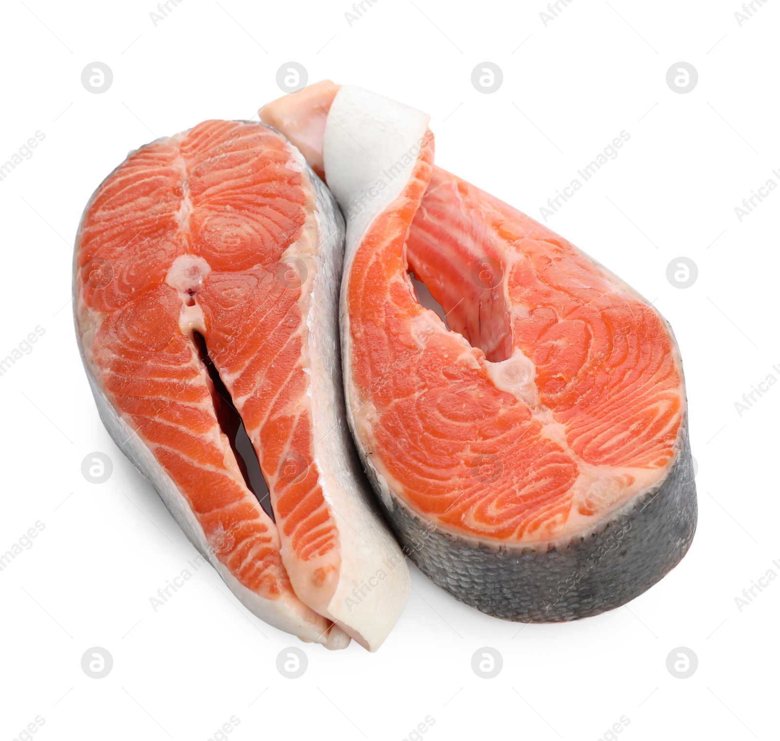 Photo of Two fresh salmon steaks isolated on white