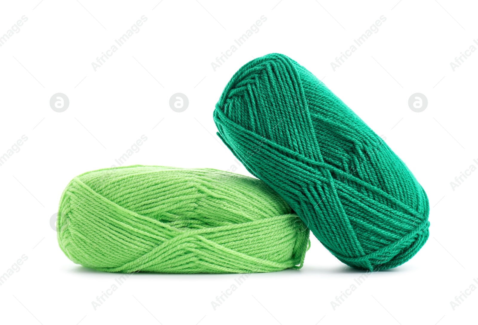 Photo of Two bright skeins of yarn isolated on white