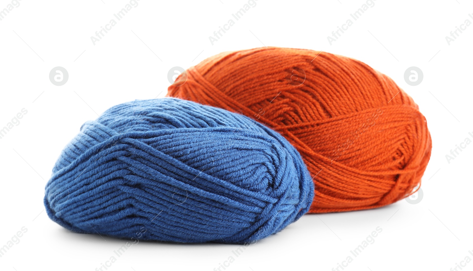 Photo of Two bright skeins of yarn isolated on white