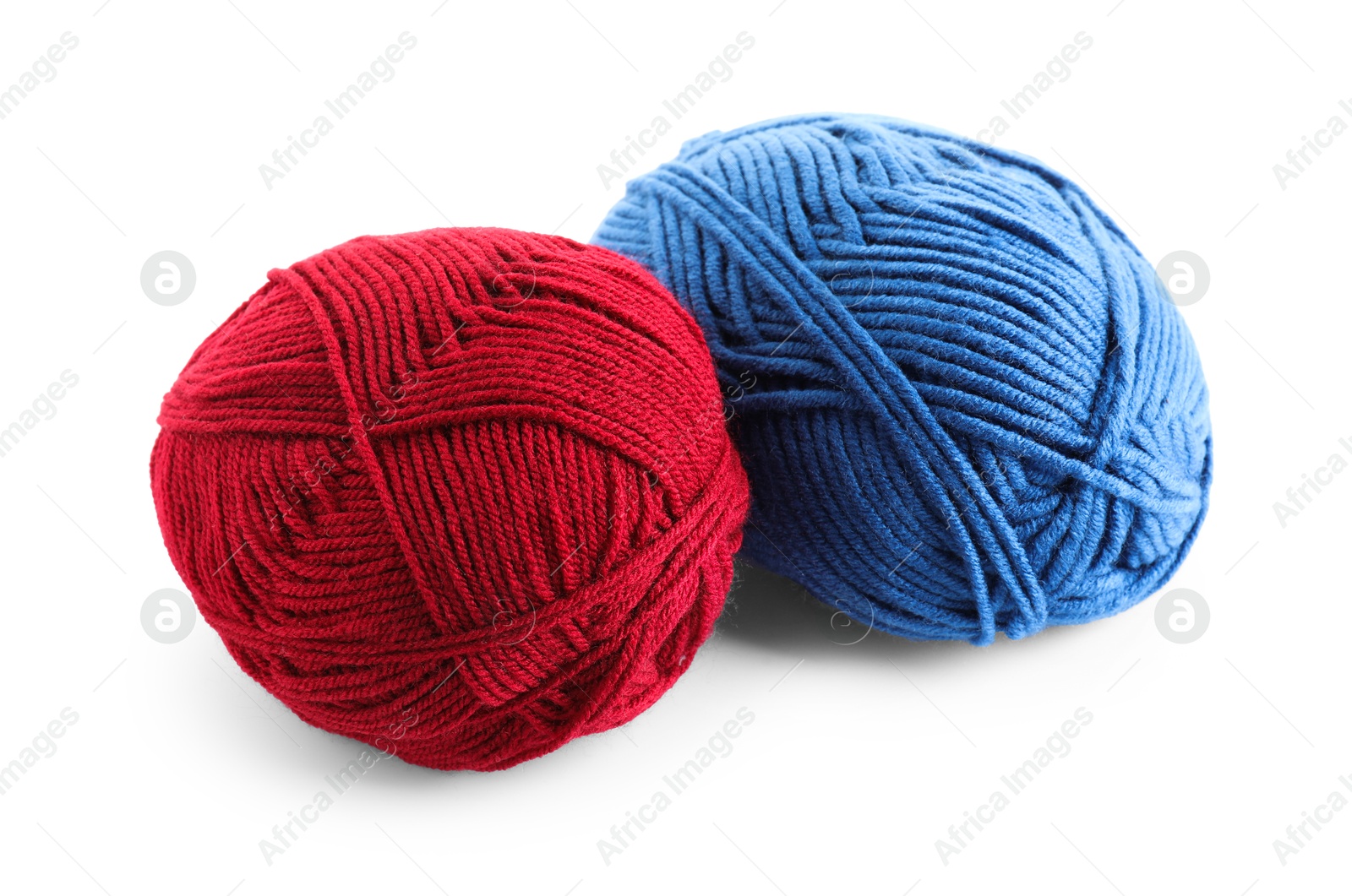 Photo of Red and blue yarns isolated on white