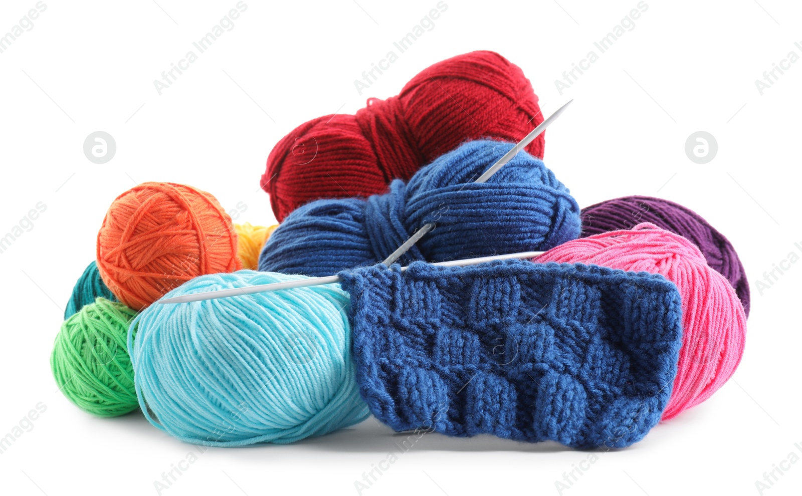 Photo of Different yarns, knitting needles and pattern sample isolated on white