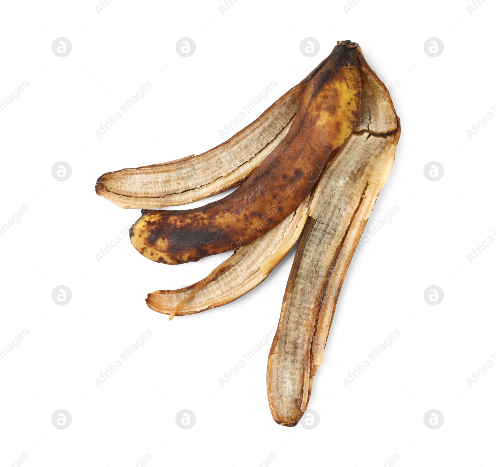 Photo of Banana peel with dark spots isolated on white, top view