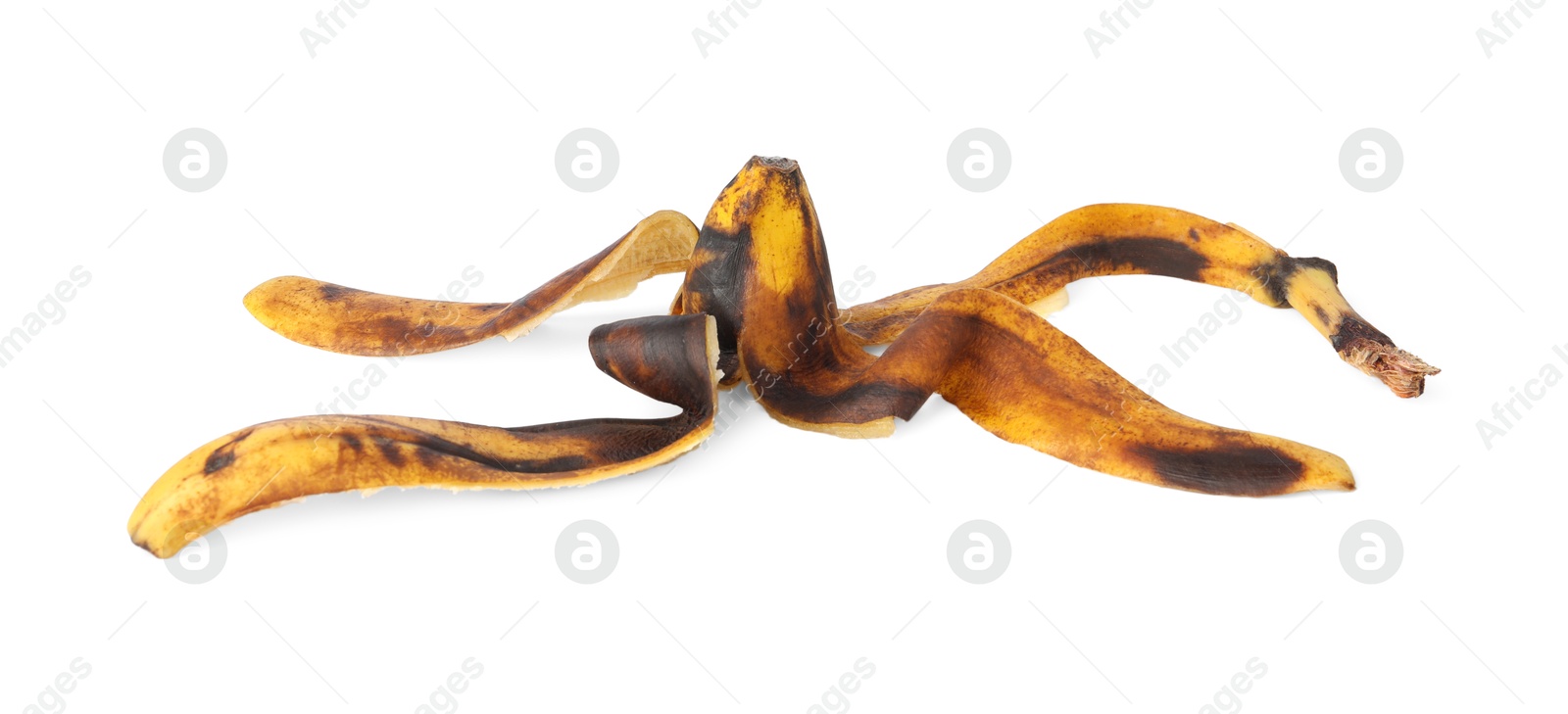 Photo of Banana peel with dark spots isolated on white