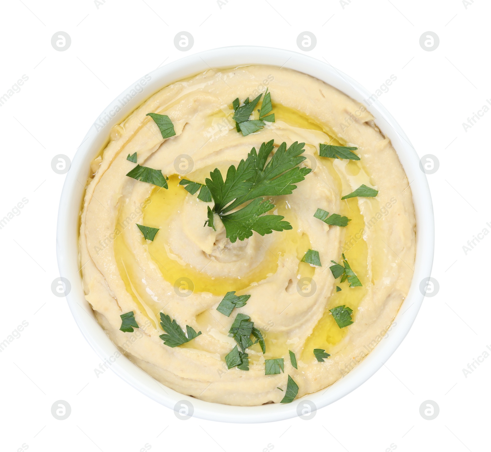 Photo of Delicious hummus with olive oil and parsley isolated on white, top view