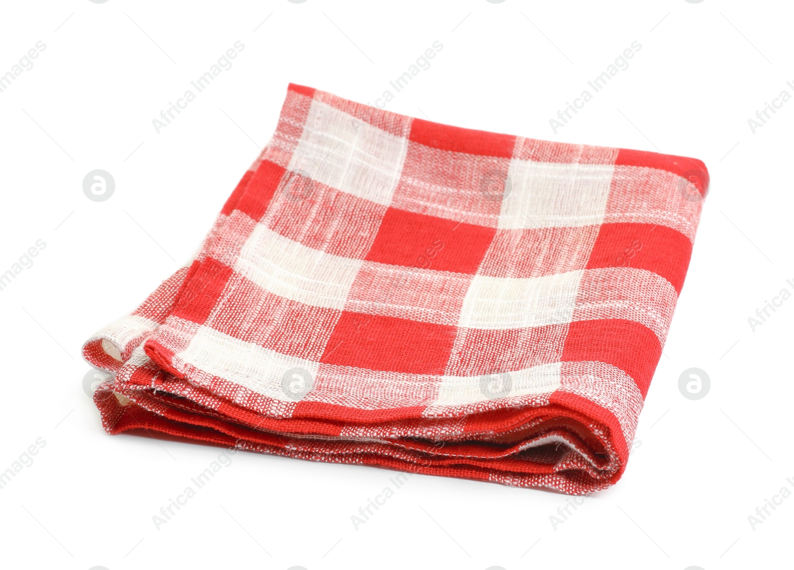 Photo of Folded tablecloth with checkered pattern isolated on white