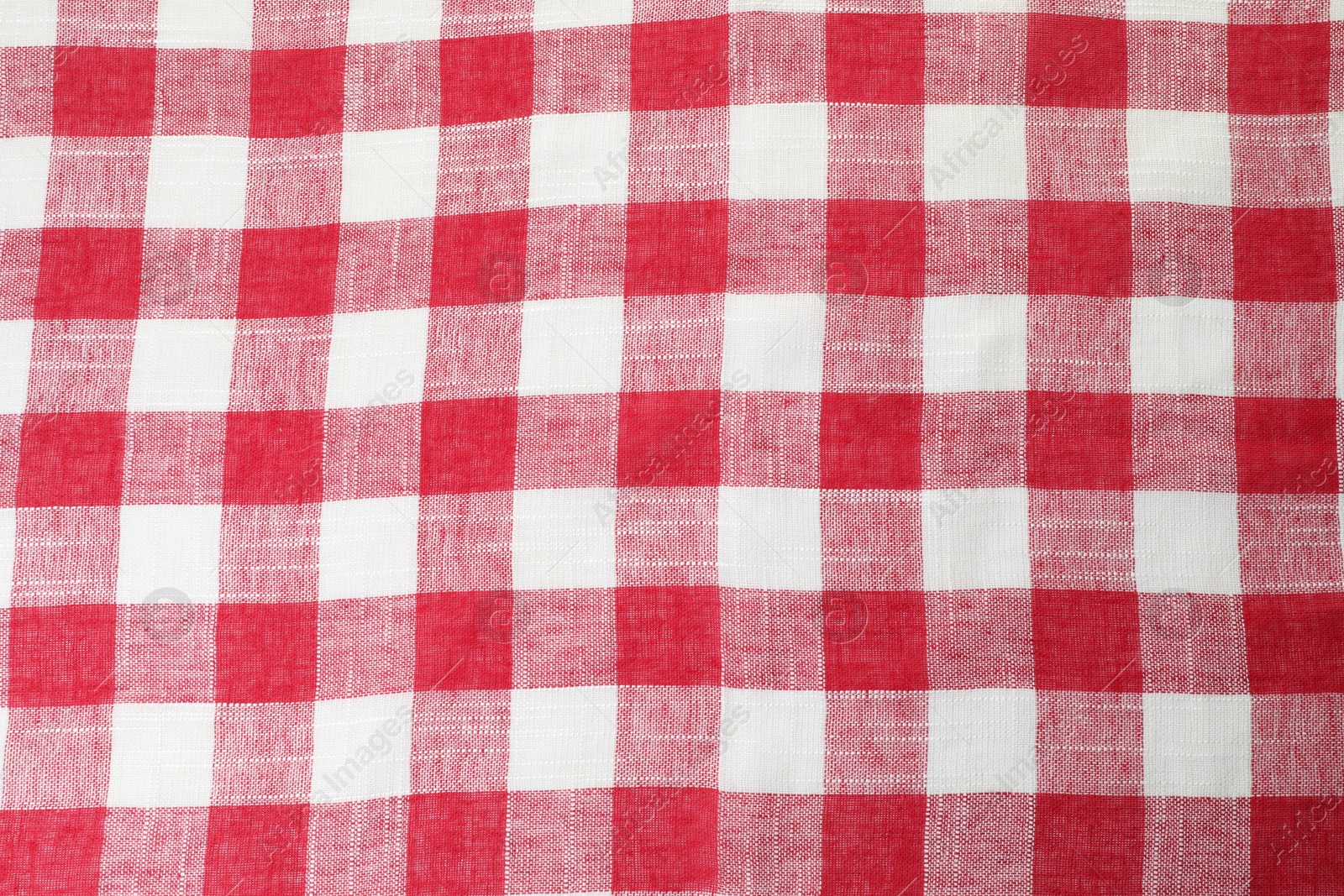 Photo of Tablecloth with checkered pattern as background, top view