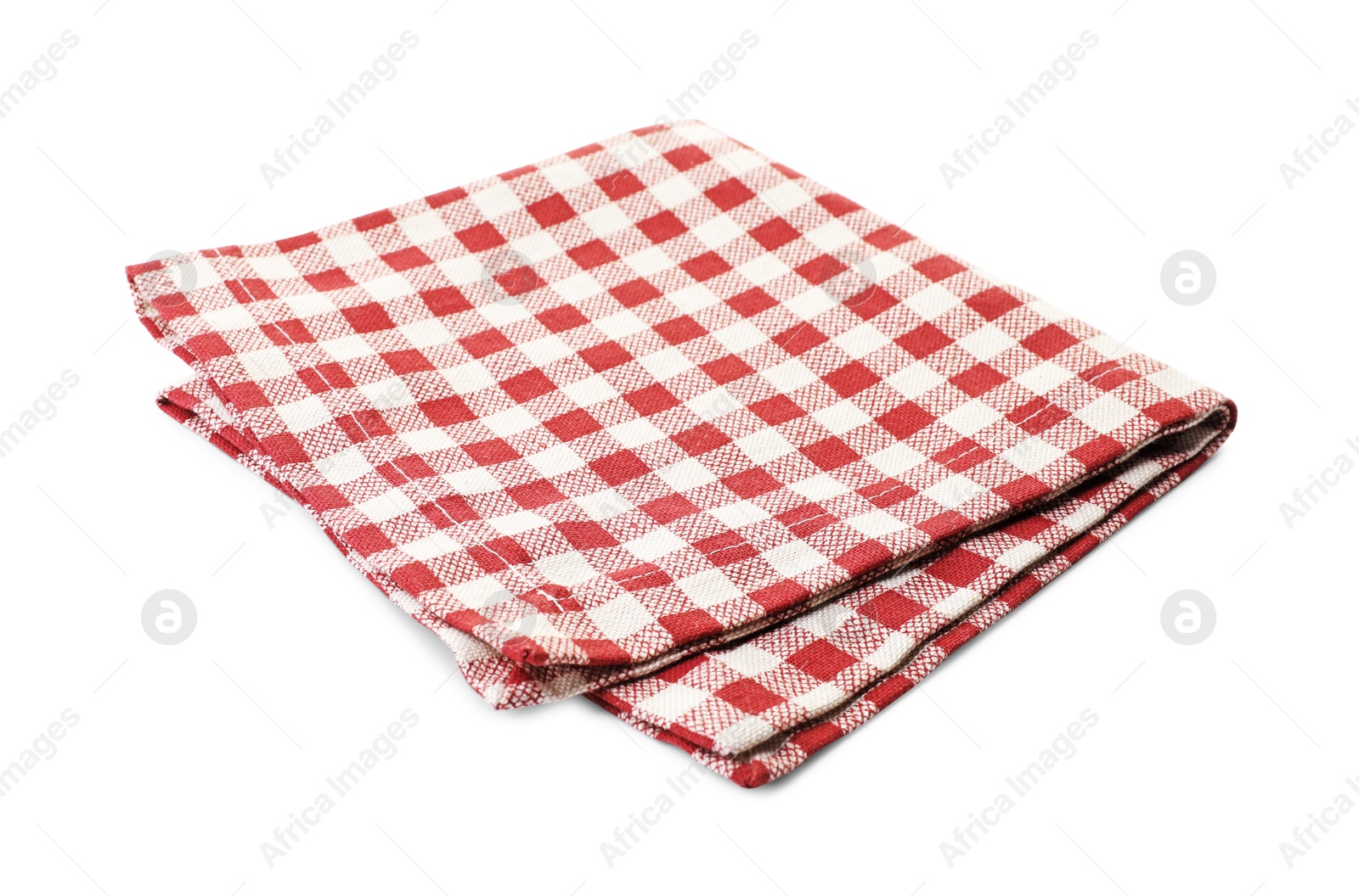 Photo of Folded tablecloth with checkered pattern isolated on white