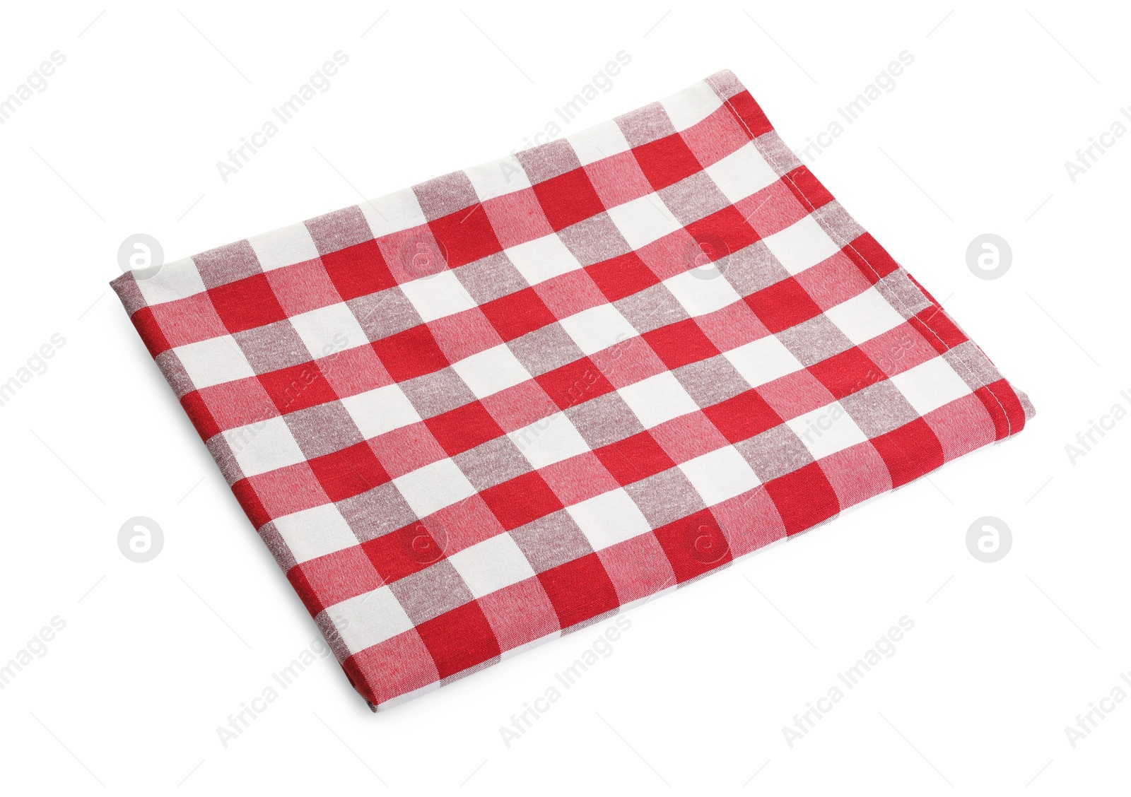 Photo of Folded tablecloth with checkered pattern isolated on white