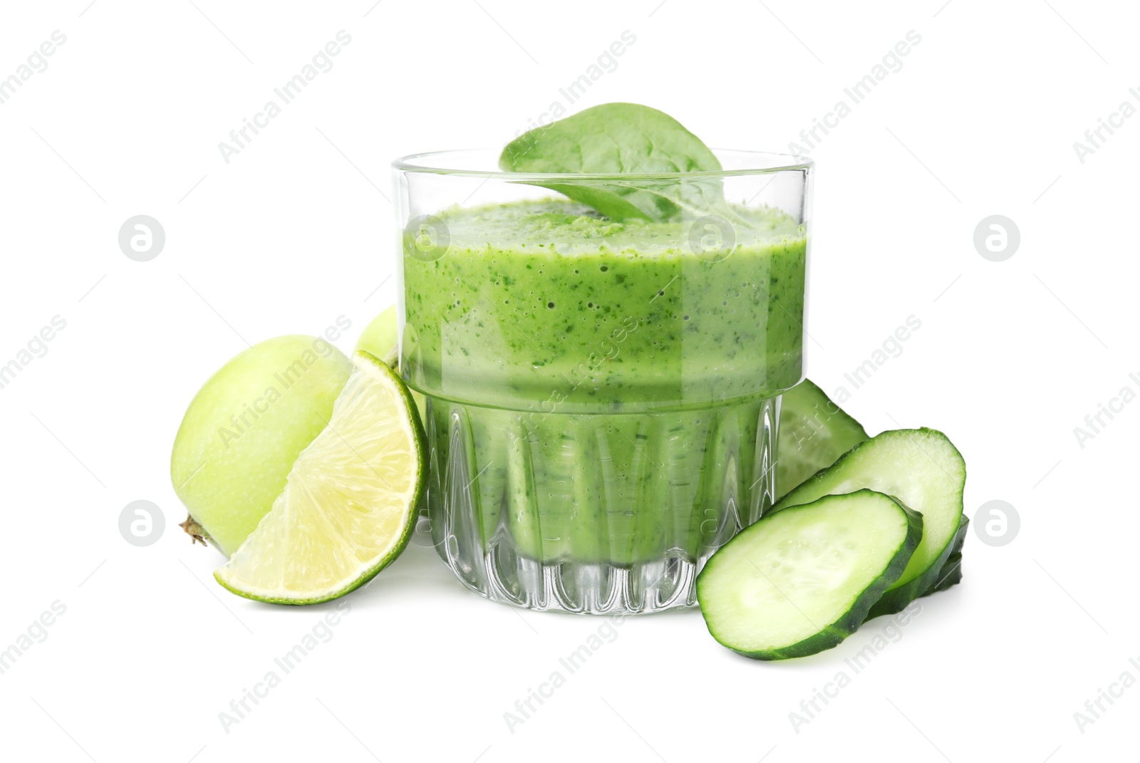 Photo of Tasty green smoothie in glass, lime, apples and cucumber isolated on white