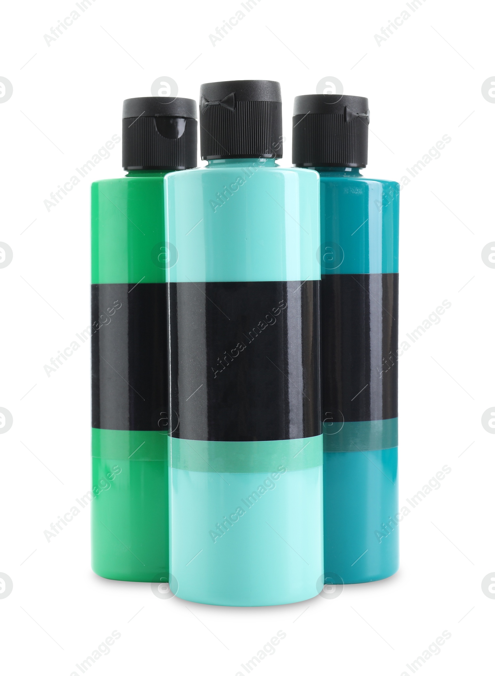 Photo of Acrylic paints of different colors in bottles isolated on white