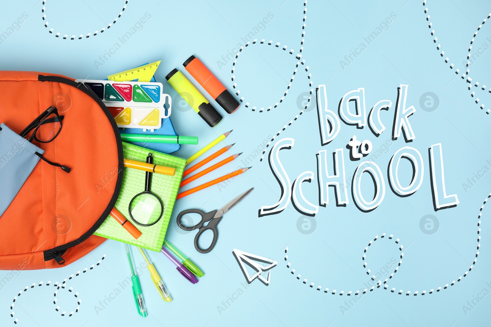 Image of Backpack with stationery on light blue background, top view. Back to school