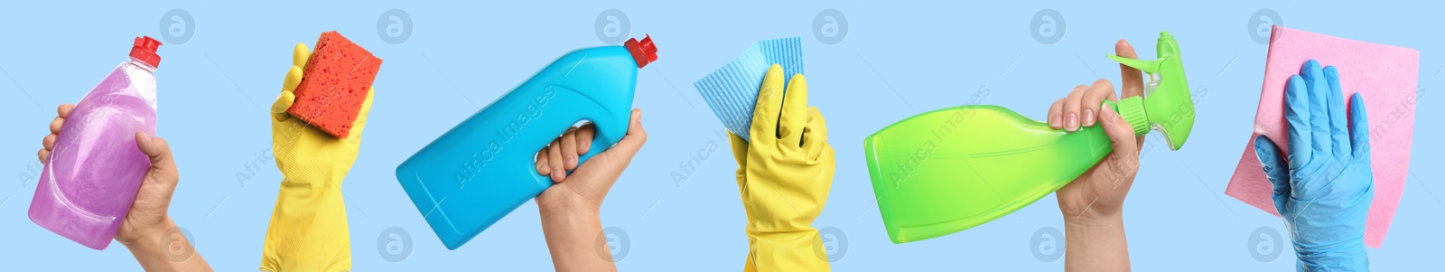 Image of Janitors holding different cleaning supplies on light blue background, closeup