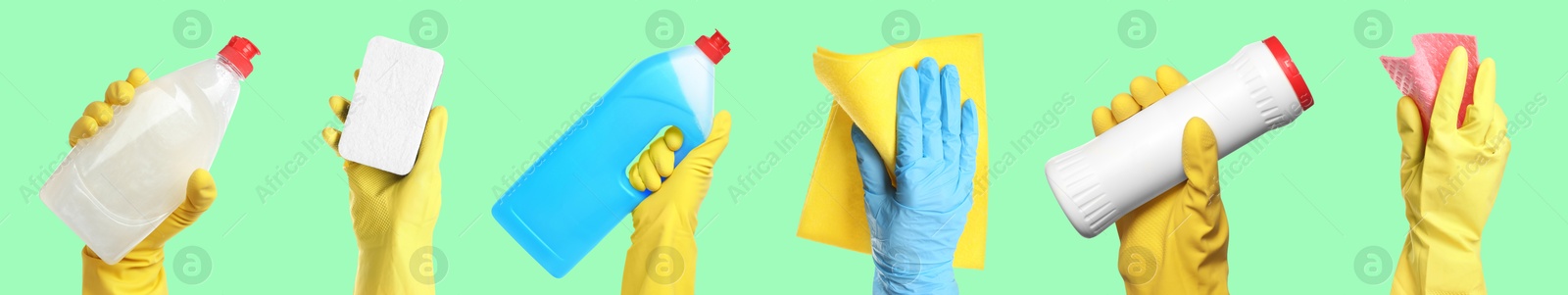 Image of Janitors holding different cleaning supplies on aquamarine background, closeup