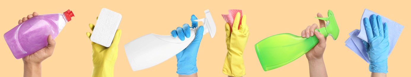 Image of Janitors holding different cleaning supplies on dark beige background, closeup