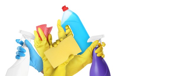 Image of Janitors holding different cleaning supplies on white background, closeup. Banner design with space for text