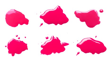 Blots of magenta printer ink on white background, set. Top view