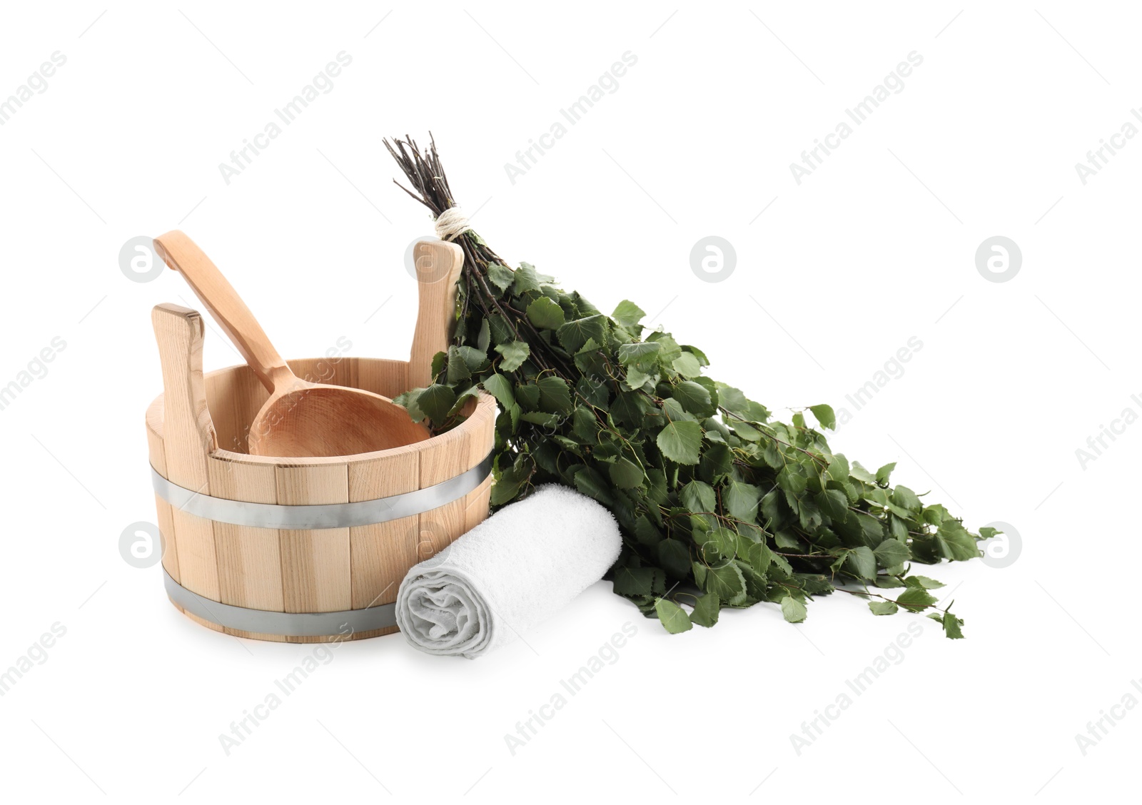 Photo of Sauna equipment. Wooden bucket with ladle, birch whisk and towel isolated on white