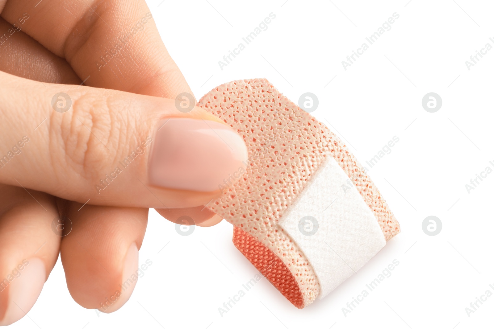 Woman putting medical adhesive bandage on white background, closeup Photo of Woman putting medical adhesive bandage on white background, closeup