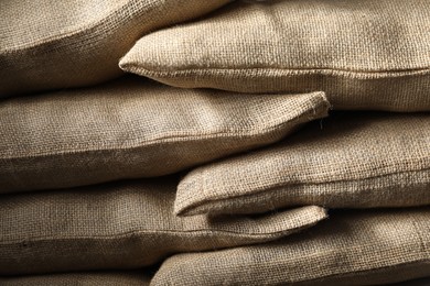 Group of burlap sacks as background, closeup