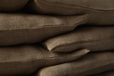 Group of burlap sacks as background, closeup