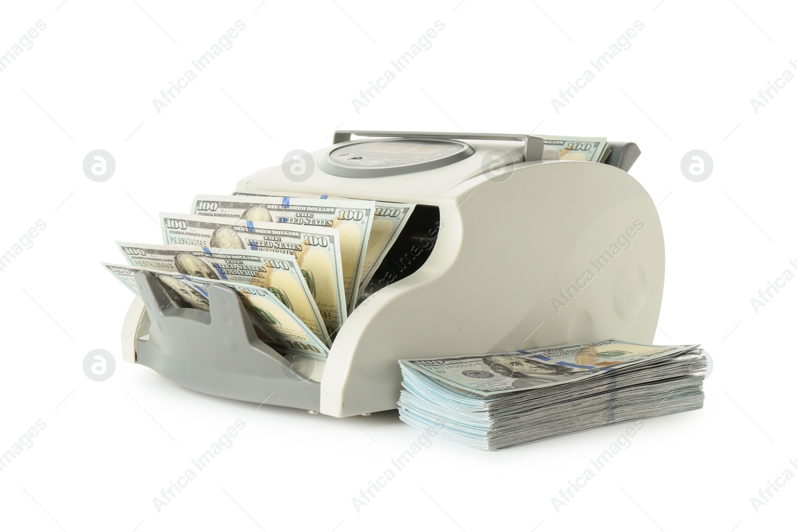 Photo of Money counter machine and dollar banknotes isolated on white