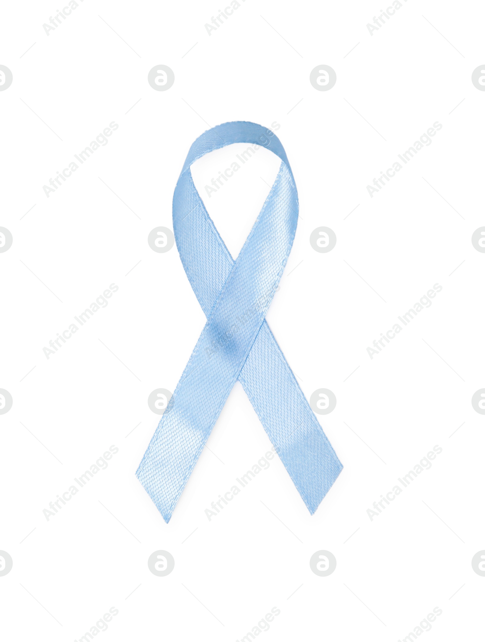 Photo of Light blue ribbon isolated on white, top view. Prostate cancer awareness