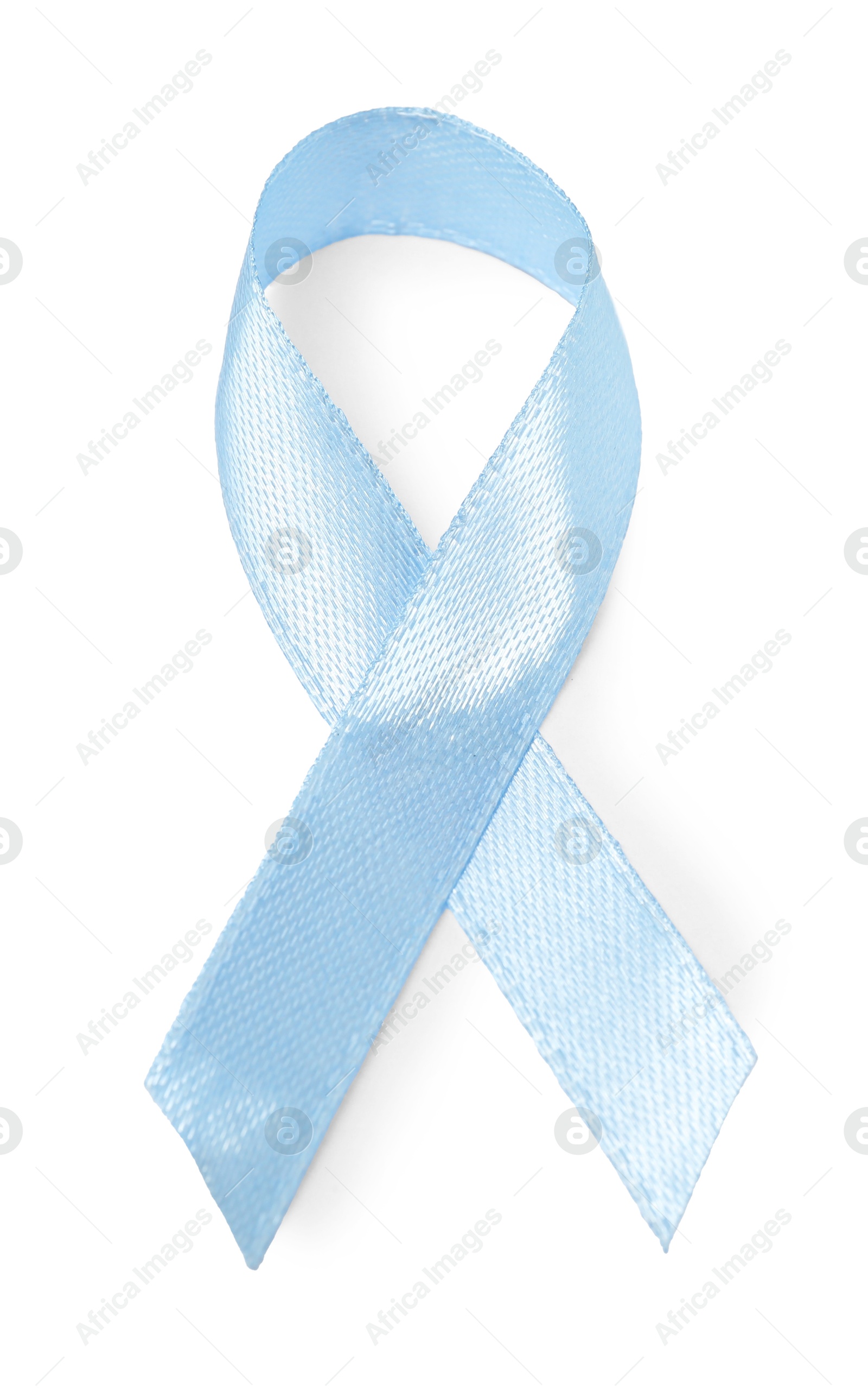 Photo of Light blue ribbon isolated on white, top view. Prostate cancer awareness