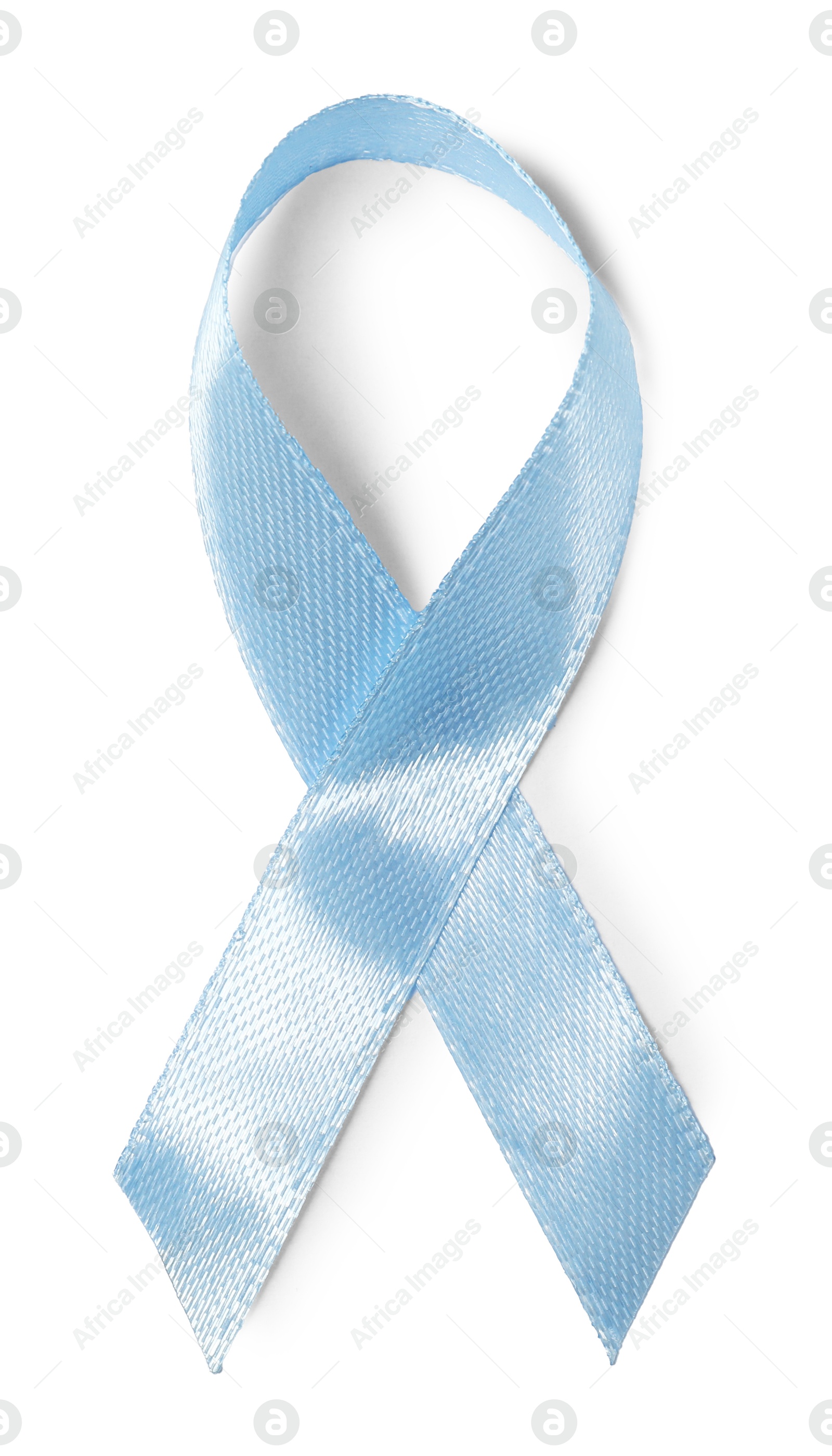 Photo of Light blue ribbon isolated on white, top view. Prostate cancer awareness