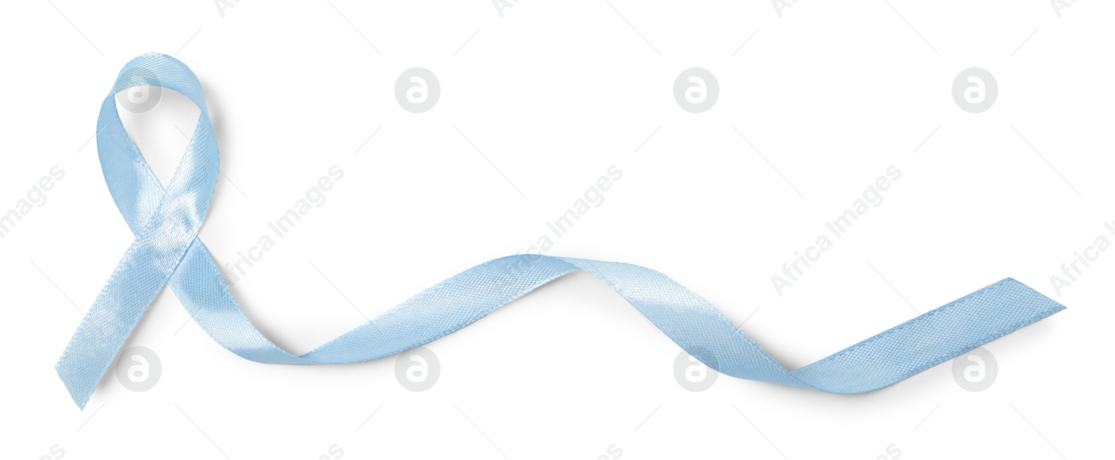 Photo of Light blue ribbon isolated on white, top view. Prostate cancer awareness