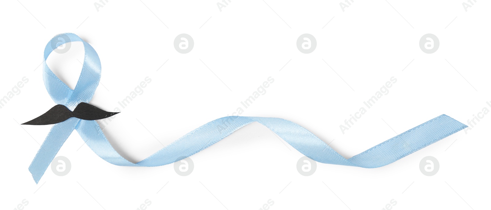 Photo of Light blue ribbon and fake mustache isolated on white, top view. Prostate cancer awareness