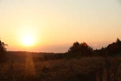 Photo of Beautiful view of sky over meadow at sunrise in morning