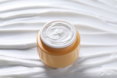 Photo of Jar with face cream, closeup. Cosmetic product